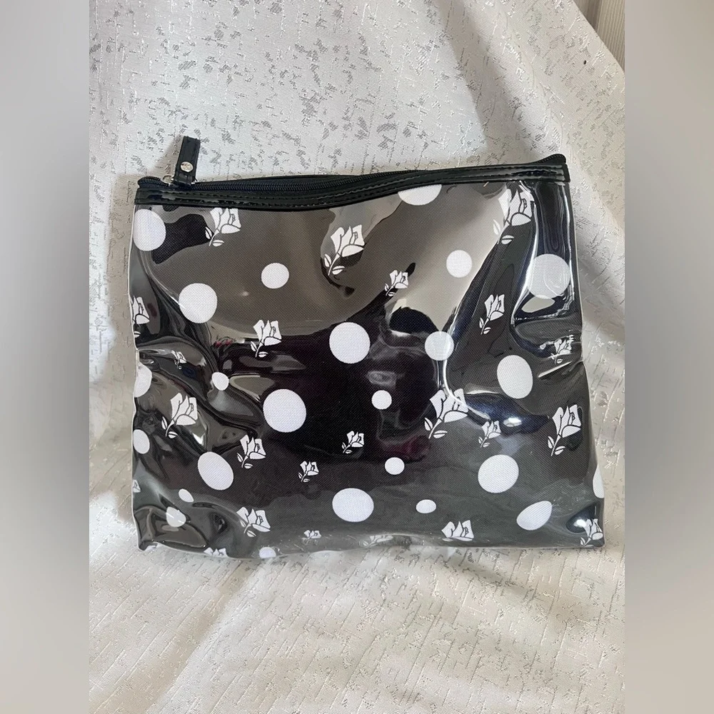 Black and White Polka Dot Cosmetic Bag with Skull Accents